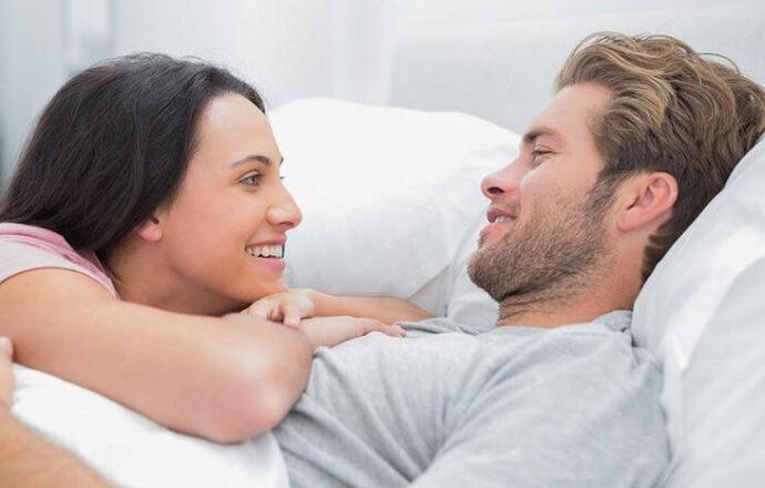 a woman in bed with a man who has increased the potency of home remedies